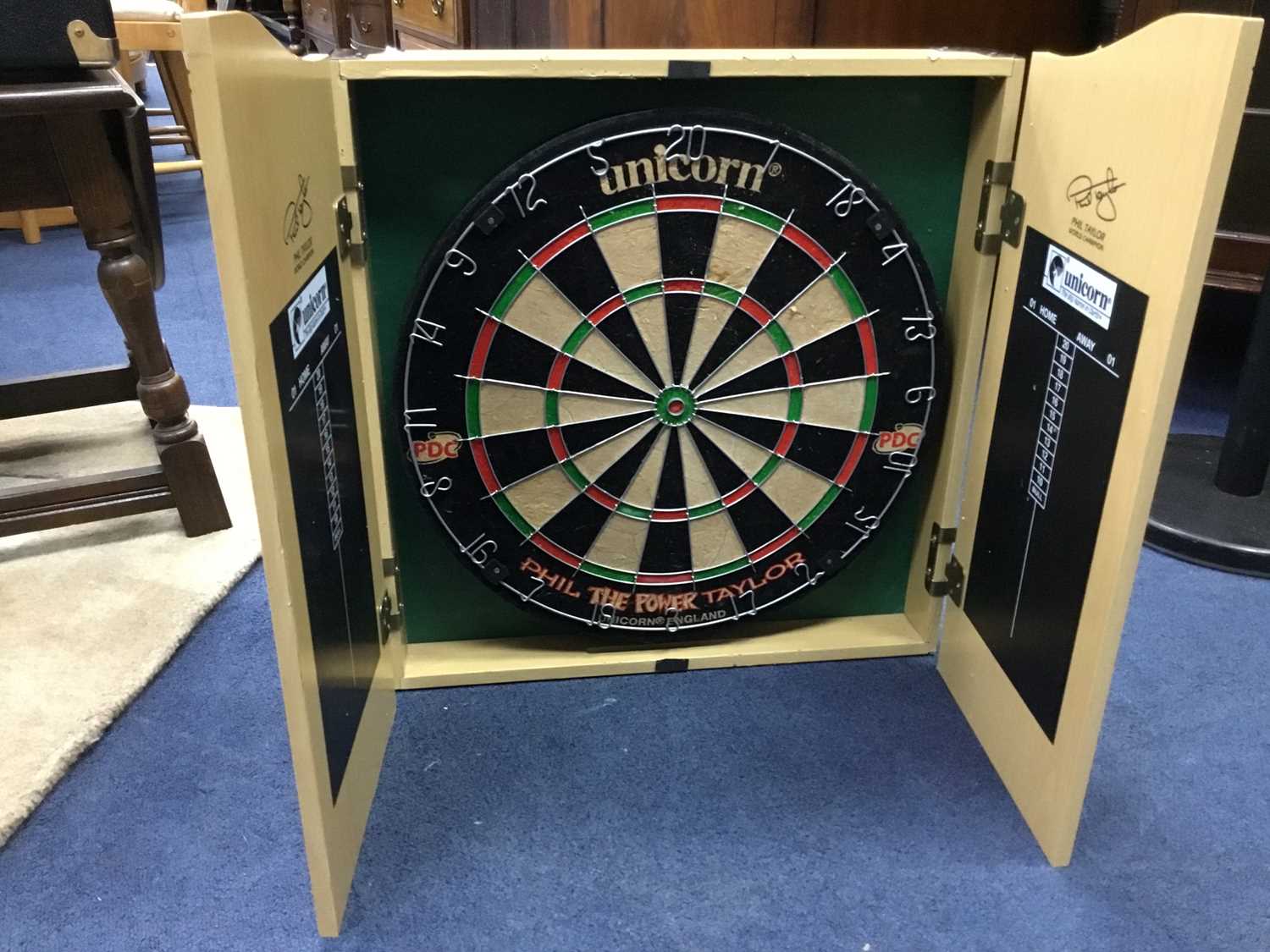 Lot 64 - A PHIL TAYLOR UNICORN DART BOARD