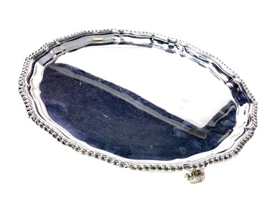 Lot 531 - AN EARLY 20TH CENTURY SILVER SALVER