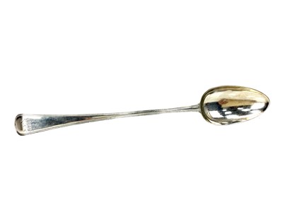 Lot 516 - A GEORGE III SILVER BASTING SPOON