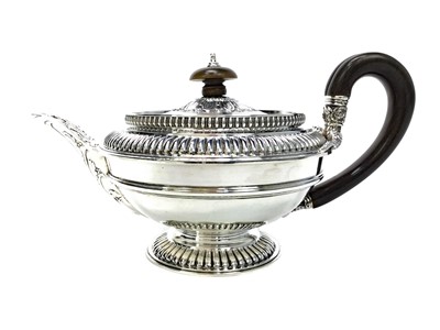 Lot 530 - A LATE VICTORIAN SILVER TEA POT