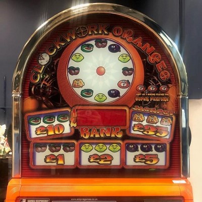 Lot 35 - A CASINO MODEL, DOME TOPPED 'CLOCKWORK ORANGES' £35 JACKPOT FRUIT MACHINE