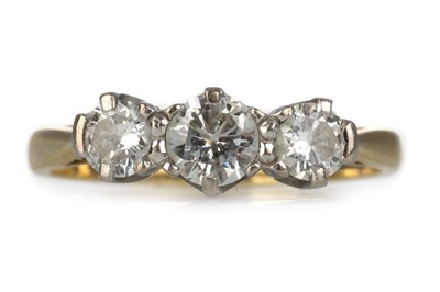 Lot 405 - DIAMOND THREE STONE RING