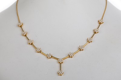 Lot 404 - DIAMOND CLUSTER NECKLACE