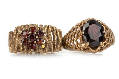 Lot 477 - TWO GARNET DRESS RINGS