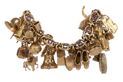 Lot 511 - GOLD CHARM BRACELET