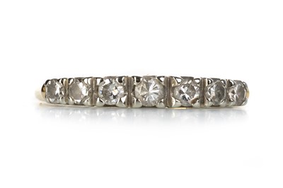 Lot 528 - DIAMOND SEVEN STONE RING