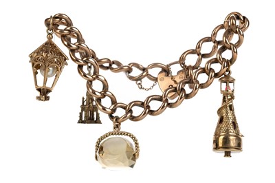 Lot 559 - GOLD CHARM BRACELET