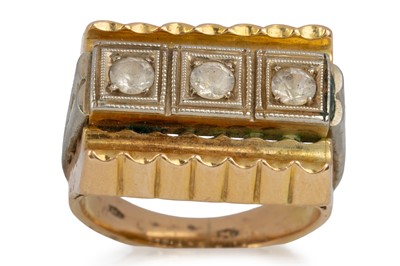 Lot 557 - GEM SET THREE STONE RING