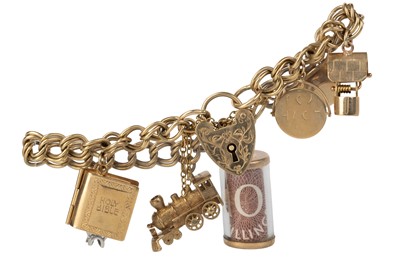 Lot 566 - GOLD CHARM BRACELET