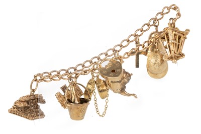 Lot 597 - GOLD CHARM BRACELET