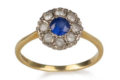 Lot 653 - SYNTHETIC SAPPHIRE CLUSTER RING