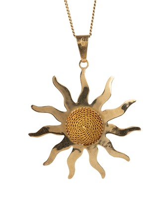 Lot 661 - GOLD STARBURST PENDANT ON CHAIN