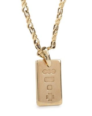 Lot 665 - GOLD INGOT PENDANT