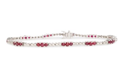Lot 684 - RUBY AND DIAMOND BRACELET