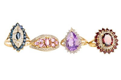 Lot 725 - FOUR DRESS RINGS