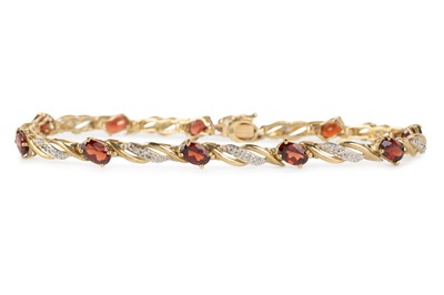 Lot 728 - GARNET AND DIAMOND BRACELET