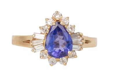 Lot 755 - CONTEMPORARY TANZANITE AND DIAMOND DRESS RING
