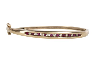 Lot 405 - RUBY AND DIAMOND BANGLE