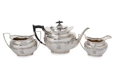 Lot 55 - GEORGE V SILVER THREE PIECE TEA SERVICE