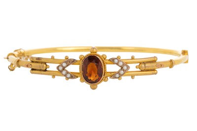 Lot 433 - VICTORIAN GARNET AND PEARL GOLD BANGLE