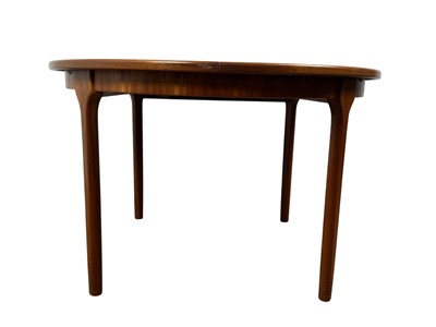 Lot 1326 - TEAK CIRCULAR EXTENDING DINING TABLE