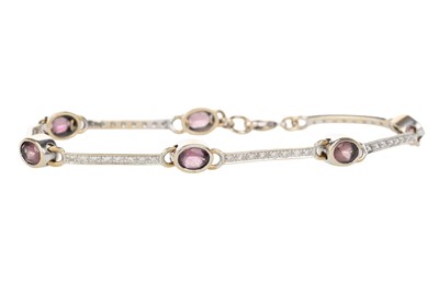 Lot 511 - AMETHYST AND DIAMOND BRACELET