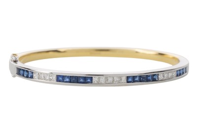 Lot 554 - SAPPHIRE AND DIAMOND BANGLE