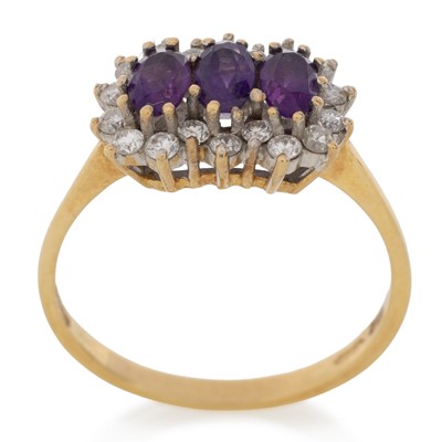 Lot 638 - AMETHYST AND DIAMOND CLUSTER RING
