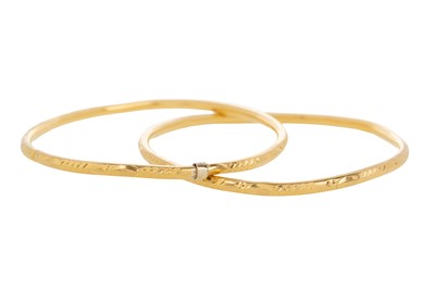 Lot 671 - PAIR OF GOLD BANGLES