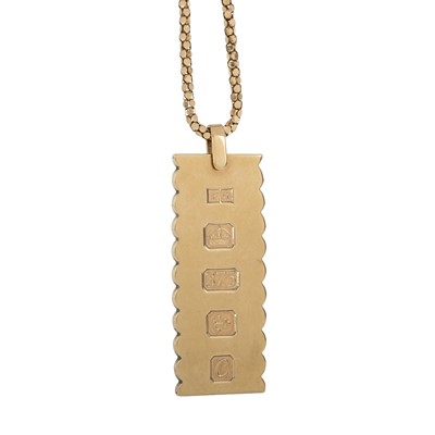 Lot 647 - GOLD INGOT PENDANT ON CHAIN