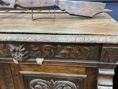 Lot 74 - CARVED OAK SIDE CABINET