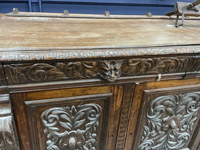 Lot 74 - CARVED OAK SIDE CABINET