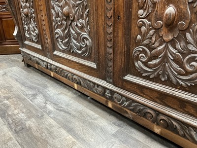 Lot 74 - CARVED OAK SIDE CABINET