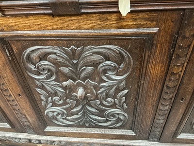 Lot 74 - CARVED OAK SIDE CABINET