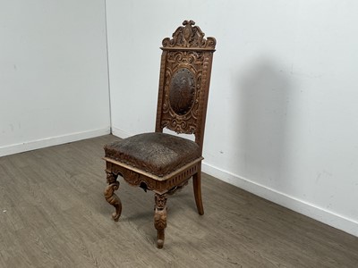 Lot 78 - PAIR OF CARVED CONTINENTAL TEAK CHAIRS