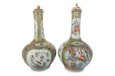 Lot 847 - PAIR OF CHINESE CANTON ARMORIAL LIDDED BOTTLE VASES