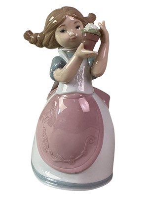 Lot 11 - NAO FIGURE OF A GIRL WITH A FLOWER POT