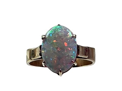 Lot 61 - GOLD AND OPAL DRESS RING