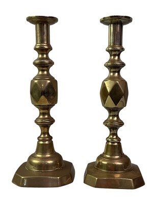 Lot 38 - SIX PAIRS OF VICTORIAN BRASS CANDLESTICKS