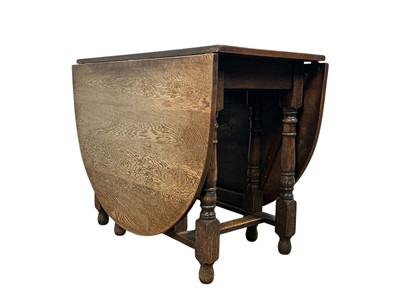Lot 144 - OAK GATELEG DINING TABLE