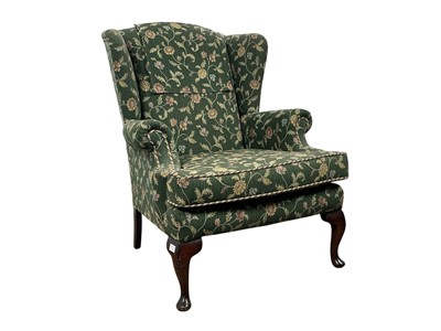 Lot 75 - UPHOLSTERED WINGBACK CHAIR