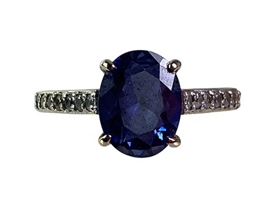 Lot 336 - TANZANITE AND DIAMOND RING