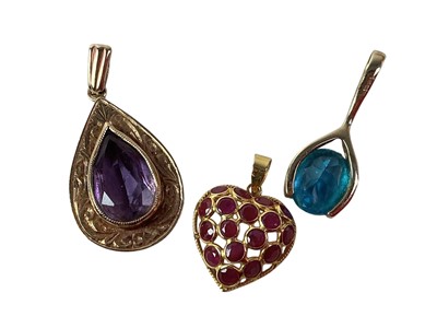 Lot 357 - THREE GOLD PENDANTS
