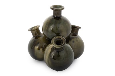 Lot 1767 - SMALL DUNMORE POTTERY GREEN GLAZED FOUR VASE FLOWER HOLDER