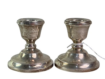 Lot 458 - PAIR OF ELIZABETH II SILVER CANDLESTICKS