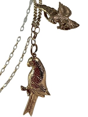 Lot 530 - TWO GOLD ANIMAL PENDANTS