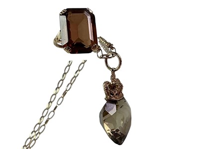 Lot 534 - GEM SET RING AND A NECKLACE