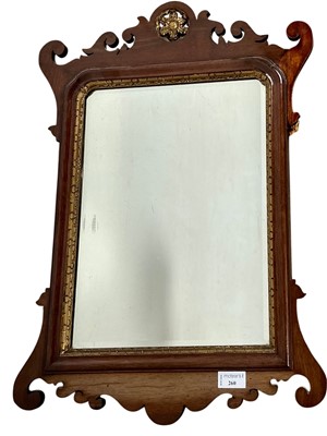 Lot 260 - MAHOGANY AND PARCEL GILT FRAMED WALL MIRROR OF GEORGE III DESIGN