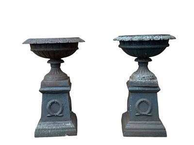 Lot 1790 - PAIR OF CAST IRON GARDEN URN PLANTERS