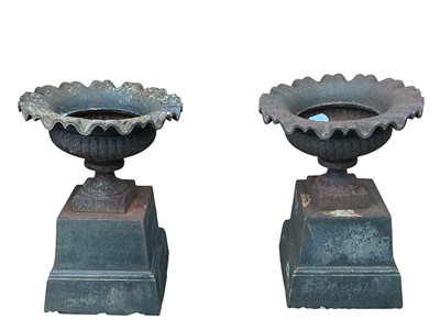 Lot 1792 - PAIR OF CAST IRON GARDEN URN PLANTERS